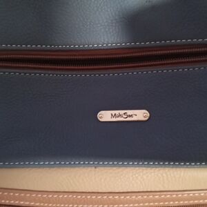 Blue and tan Multi Sac purse.